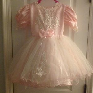 Soft pink dress with overlay lace with beading.